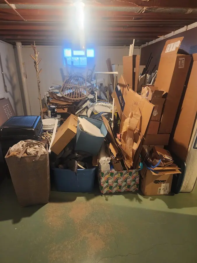 Roll-off dumpster container at job site for 20 Yard Dumpster Rental in Lakeshore